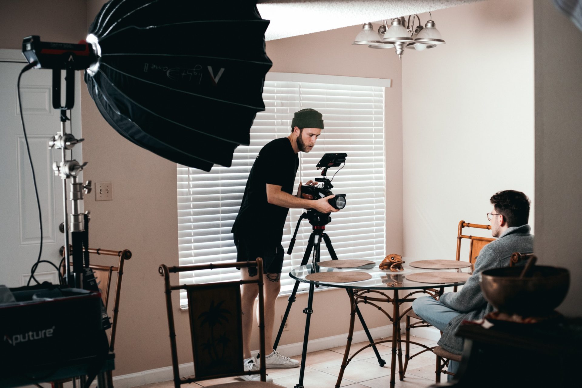Two guys recording a video with equipment