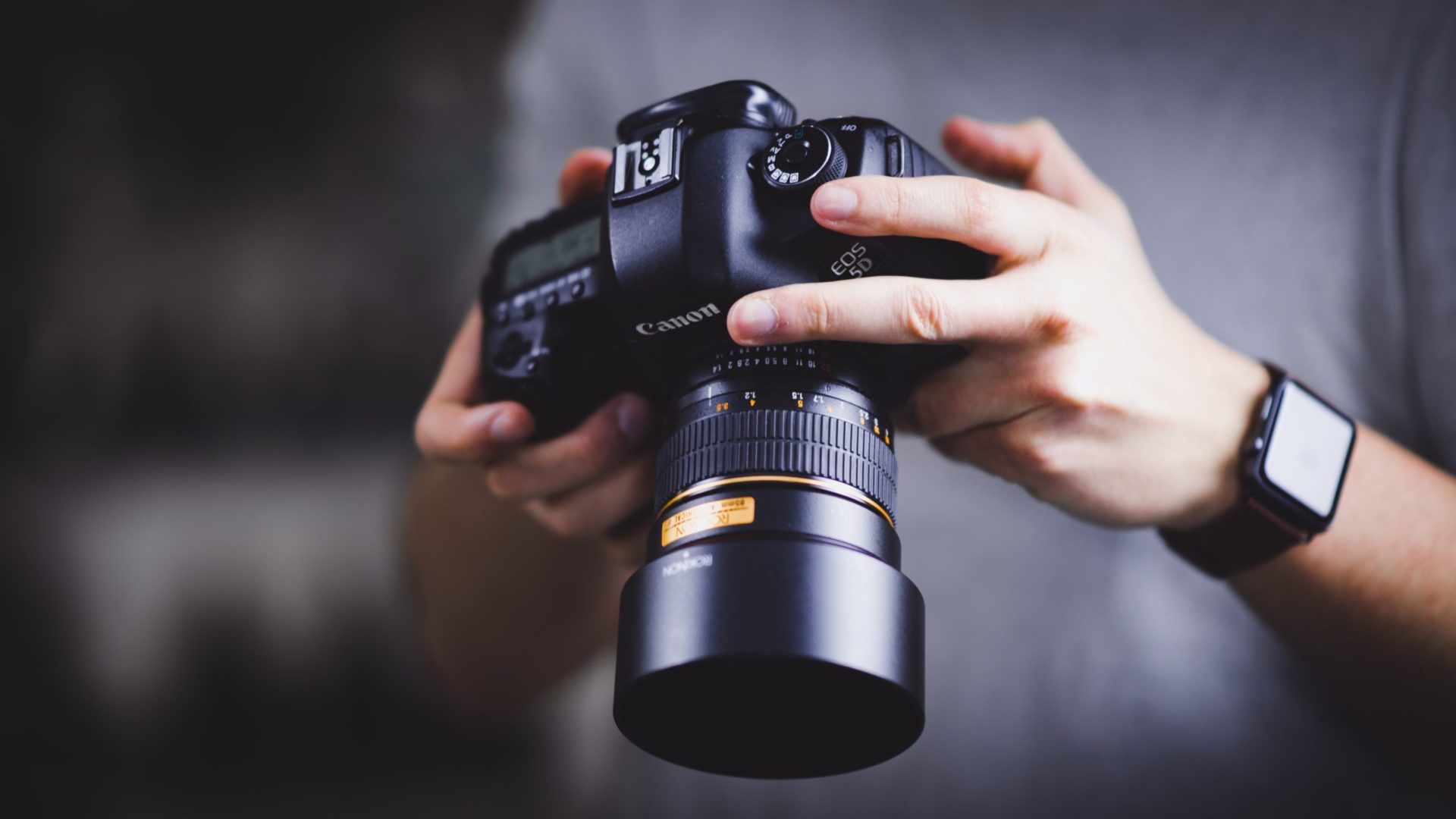 person holding a camera